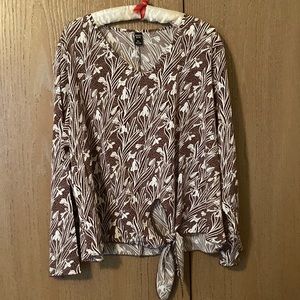 Cream and brown colored top